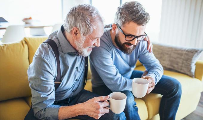 Uitvaartverzekering - illustratieve afbeelding van vader en zoon