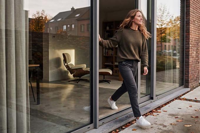 A couple looks at their windows